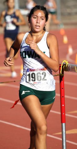 On Rogers’s heals,senior Alina Rulvabcaba keeps pace to  come in 4th on the Poway squad
