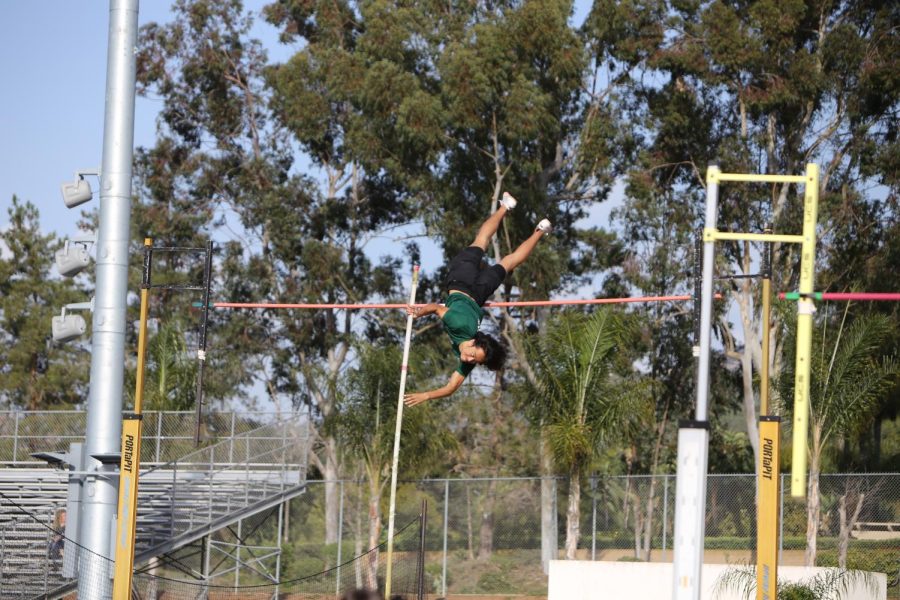 Setting the bar: Senior Jaeden Richards vaults over the bar in the March 10 competition with the San Pasqual Golden Eagles. 