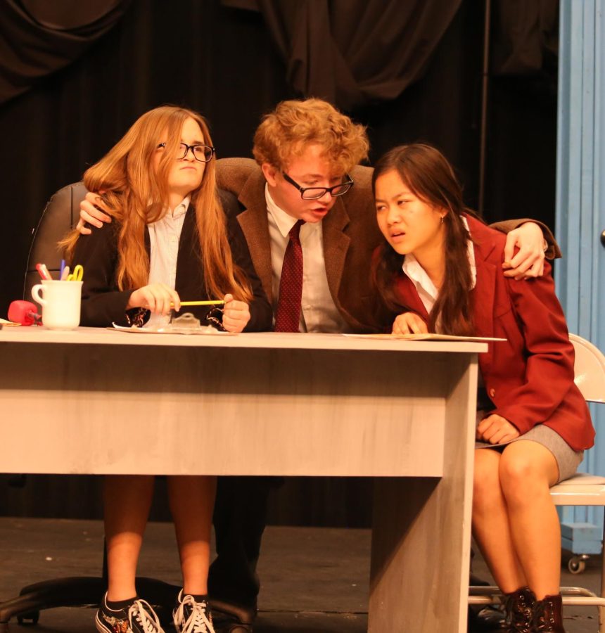 Interviewer one (freshman Emma Avary) and Interviewer two (junior Natasha Phanthavong) are annoyed when Dean (senior Aydian Anderson) tries to give them advice. 
