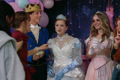Students dressed as princesses bring their magical charm to the photo booth, creating whimsical memories.