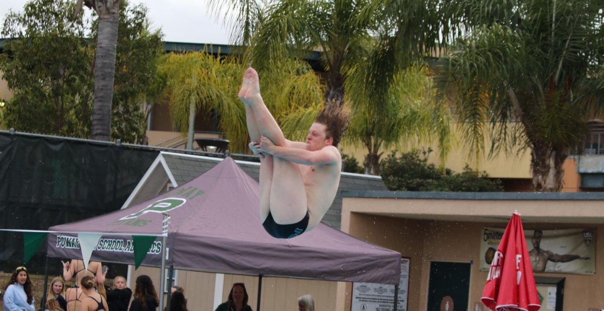 Junio++Connor+Liddle+does+a+pike+dive+into+the+Poway+High+School+pool.