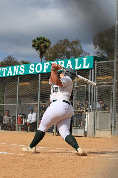 Senior Sophia Burmeister hits the ball right down center field. 