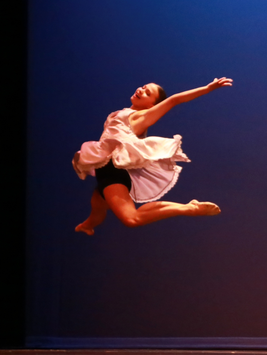 Danica Bayerle springs into the spotlight in her senior lyrical solo.