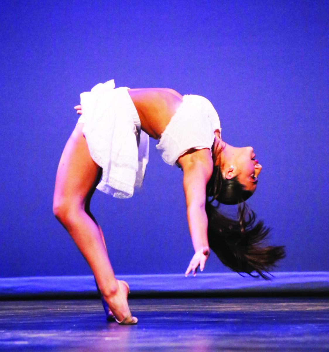 Senior Jacqueline Edwards performs her duet with senior Kezi Thibodeau. 